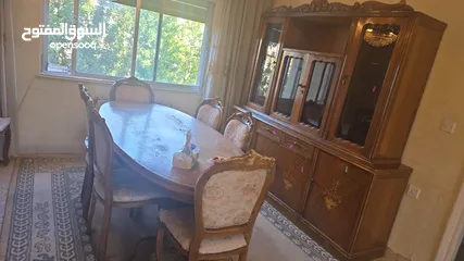  1 بوفيه وطاولة 8 كراسي بدهم دهان وصيانة
