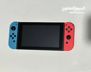  1 Nintendo switch v2 with all its stuff plus case, 32 extra gb (sd card) and Mario kart!