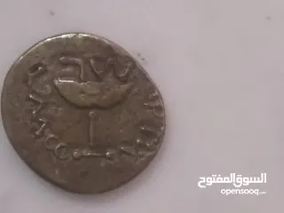  3 عملة معدنية عمرها 2000سنة