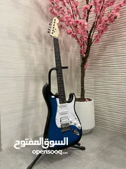  1 جيتار الكترك المشرق كفاله سنه كامله كولتي عالي مع شنته وريشه
