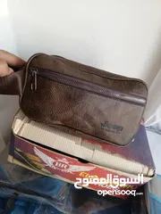  12 محل ملابس قطنيات اصلية واحذية طبية جلد اصلي