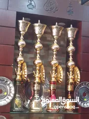  6 ديكور محل خشب خزائن رفوف زجاج + بضاعھ مشكل