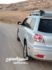  12 ميتسوبيشي اوت لاندر 2003