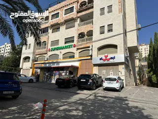  2 شقة للبيع - عين منجد - وحيدة بطابقها - 170م - بالقرب من سوبرماركت بغداد