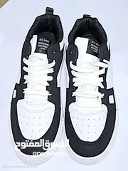  1 Black and white designer shoes  size: 42 negotiable price  FREE DELIVERY