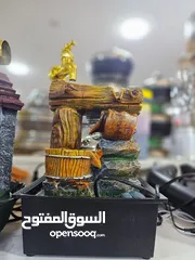  17 نافورة ديكور بمجرى ماء وشلال مضيء أضف لمسة من الهدوء والجمال الطبيعي لبيتك أو مكتبك مع هذا التص