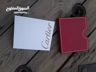  1 كارتير ملحقات  كارتير وعلبة ساعه بانراي و روليكس اصلي