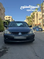  1 متسوبيشي لانسر2007 وارد الخليج