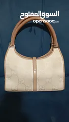  1 Gucci handbag