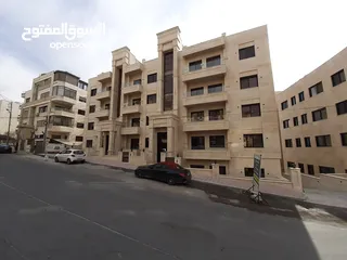  29 شقة جديدة طابق أرضي مساحة 135م2 للبيع في عمان منطقة الرابية بالقرب من شارع المدينة المنورة