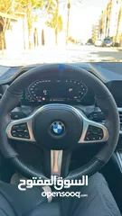  11 BMW330e Mهايبرد