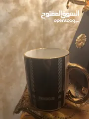  1 كوب (مج) اخضر الون يده ذهبية وجميل جدا ثقيل الحجم