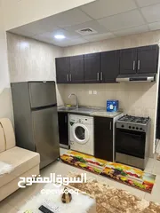  22 For rent in Ajman, studio in Al Yasmeen Towers, opposite Ajman City Centre, new furniture, easy exit