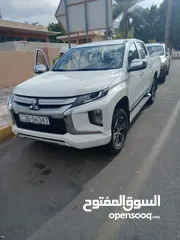  4 بكب ميتسوبشي L200 2023  وارد الشركة التجارية الوكالة