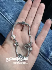  1 اسوارة بندورة اصلية مع 7 تشارمز