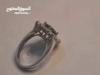  15 خاتم ستاتي ياقوت ازرق مع حواف الماس + فضه925