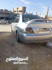  10 لانسر 2005 وارد الكويت 4 جيد ماتور 1600 الاصلي "الملا"