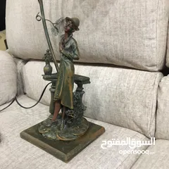  1 تمثال برونزي مع شمعدان فضة