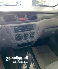  3 ميتسوبيشي لانسر 1600cc 2004 نظيفة بحالة جيدة