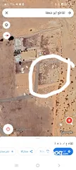  2 قطعة ارض سكنية مسورة وفيها ماجن وجيران كويسين تبعد عن المعبد 200متر