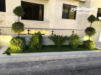  13 تنسيق حدائق