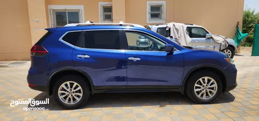  10 Nissan Rogue 2020 SV AWD(Blue) and Rogue 2020 Sport(White) for sale in Al Ain, Please WhatsApp,,,