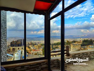  12 شقة  باطلالة خلابة على جبال السلط بالقرب من قصر الحمر في ميسلون   ممكن قبول نصف الثمن أرض في عمان