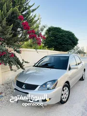  1 ميتسوبيشي لانسر 2010