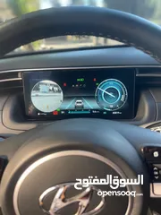  12 هونداي توسان ( هايبرد)  بنزين + كهرباء  فل الفل اضافات