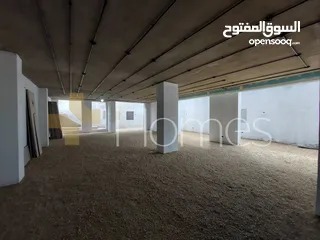  2 -معرض للايجار ذوموقع مميز في شارع عبدلله غوشة بمساحة 360 م