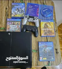  1 ps4 for sale urgently  2 controller  whit 5 games all cables