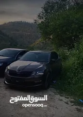  14 سكودا أوكتاڤيا 2019 للبيع لون بني دفع امامي السيارة ماطور 2000 بنزين عداد ديجيتال بصمة شاشة