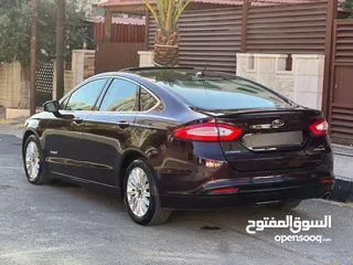  6 فورد فيوجن موديل 2013م مواصفات تيتانيوم نخب اول .  فحص سبعه جيد نخب اول نظام هايبرد وبطاريه نخب اول
