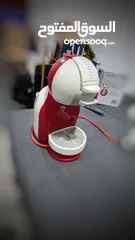  1 ماكينة صنع قهوة ماركة دولتشي غوستو Dolce Gusto