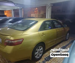  2 تويوتا كامري  2007  GLX  ذهبي تخشيبة وستارة خلفية  شاشة وكاميرا