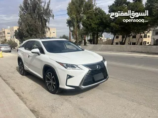  5 لكزس RX450hL موديل 2018 لون ابيض لؤلؤي وارد وصيانه الوكاله اعلى تصنيف من فئتها