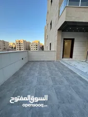  9 شقة طابق ارضي مع ترس وكراج سوبر ديلوكس باجمل مناطق شفا بدران