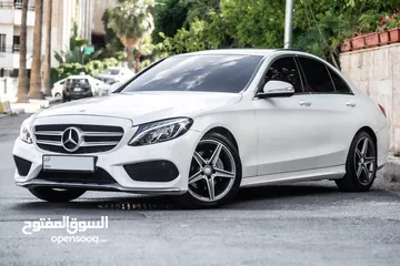  1 Mercedes C200 Amg kit 2015 مميزة جدا،  وارد و بحالة الوكالة