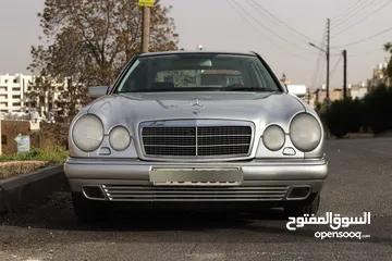 5 مرسيدس E200  موديل 1999 فل مع فتحة