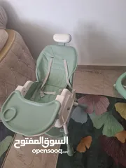  2 كرسي طعام +كراجة مشي بحالة ممتازة بدي ابيعهم مع بعض