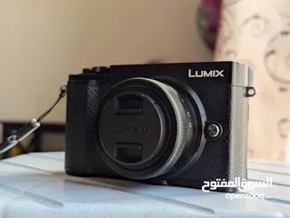  4 lumix GX9 Mirrorless camera with 3 lenses