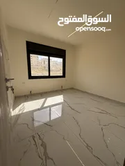  20 شقه طابق ارضي 144متر مع ترس 30 متر للبيع في جبيهه حي المنصور بموقع مميز