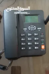  1 تليفون خلوي على شكل تليفون ارضي