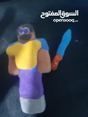  2 شخصيات ماين كرافت درع و سيف و شخصية و 2زينة 2بلوكات كهف