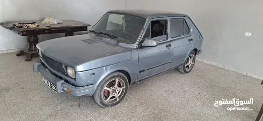  14 فيات 127موديل 1980غيار عادي ماتور 900قانوني عليها ترخيص سنة