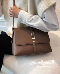  8 شنتة ستاتي اصلي مع العلبة  جلد طبيعي جودة عالية جدا  سحاب ويد طويلة  مقاس 21×27