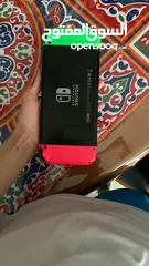  4 نينتيندو سويتش + 2 joy con إضافيتان مع شمعة مع مسكتين مع اغراضه ( بدون ألعاب )و شنتة