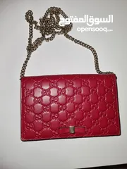  2 Gucci wallet/purse