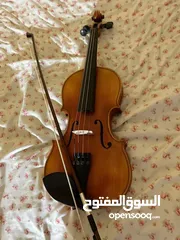  1 الة كمان وجيتار
