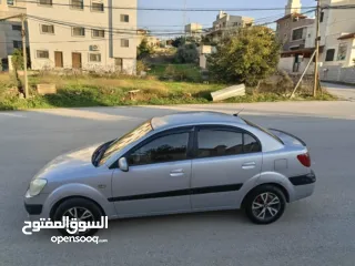  4 كيا برايد 2009 اتماتك دهان شركه ولا غرام بويا بسعر حرق 32000 ألف نقدا بدل وارد منبدل